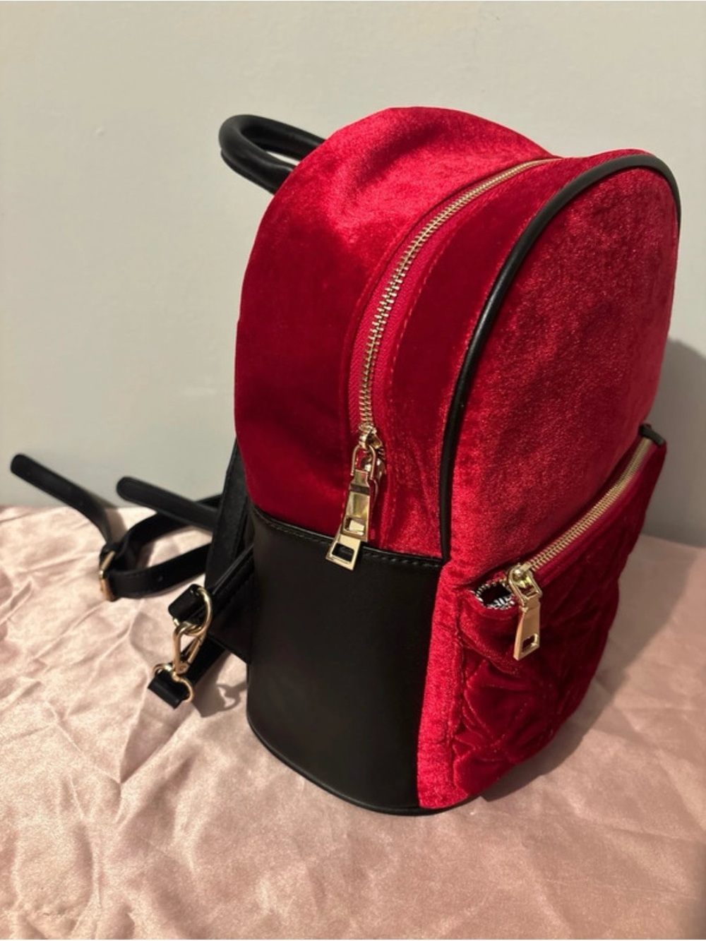 Red Velvet Mini Backpack with Black Trim and Gold Hardware